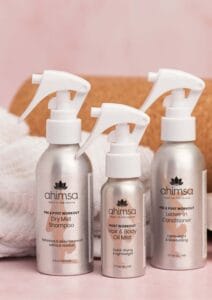 Complete Ahimsa gym bag hair kit — leave-in conditioner, dry mist shampoo, and oil mist for active women